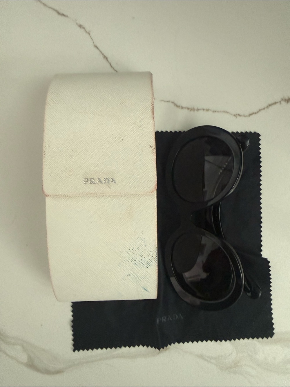 Prada Black Round Sunglasses with Cream Case